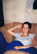 Katherine (Kat) McDougal Wheeler McCandless; on couch at home in Canandaigua